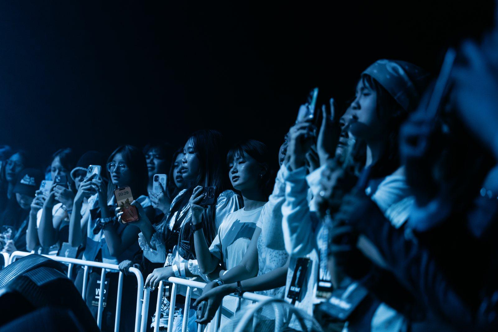 Front row, phones up.